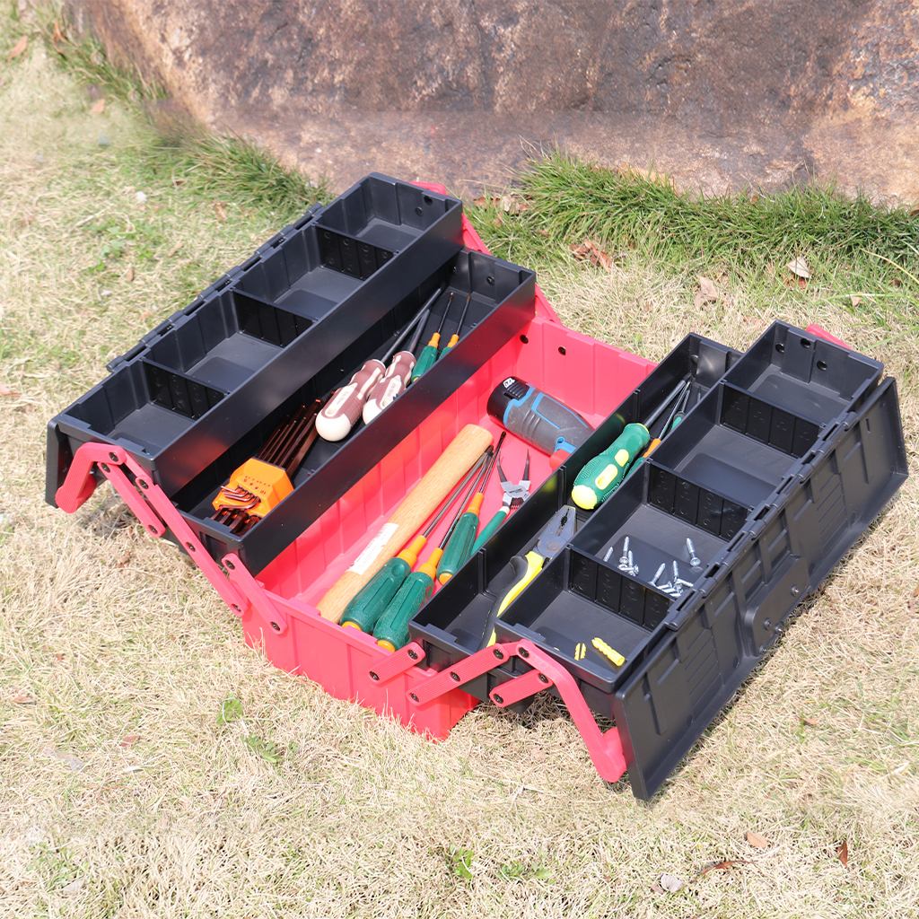 This is a toolbox Red 5-layer plastic toolbox open with tools front view